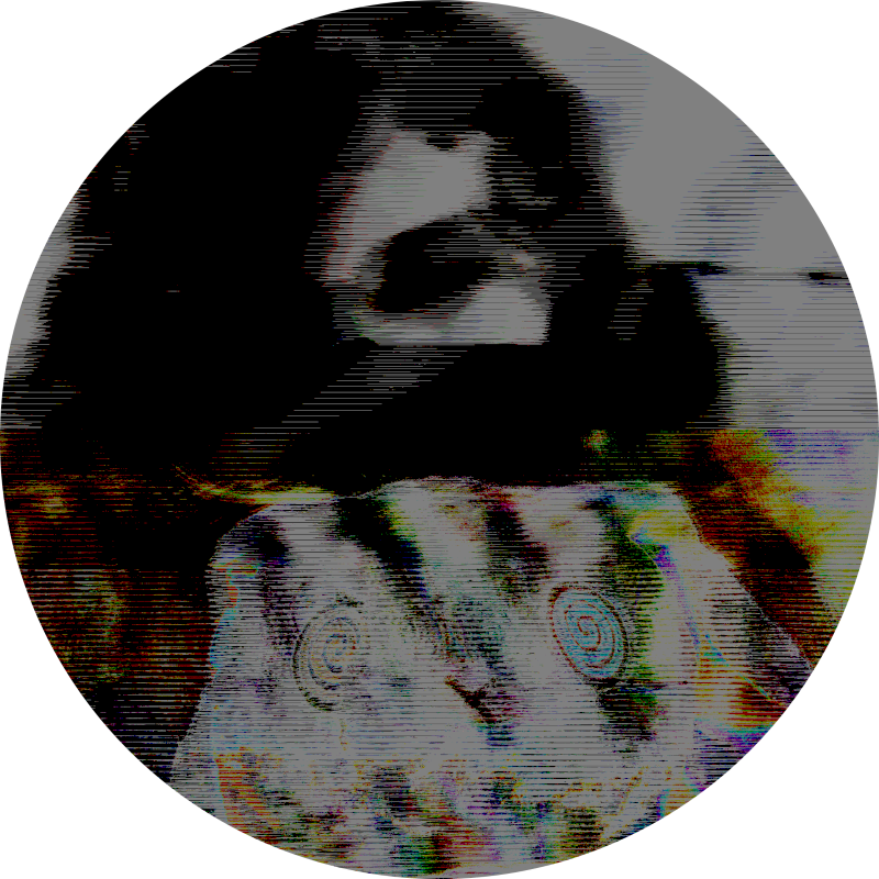 a datamoshed image of me holding a plush bunny.